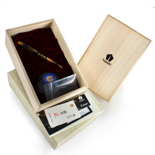 Load image into Gallery viewer, The fountain pen arranged in the presentation box with the ink bottle, cartridge, certificates, artist signature card, and packaging.
