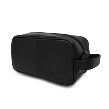 Load image into Gallery viewer, Angled view of the back panel of the black leather shave kit.