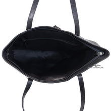Load image into Gallery viewer, Interior view of the black tote bag, featuring a zipper-closing pocket.