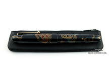 Load image into Gallery viewer, Angled view of the pen case with a Namiki Yukari fountain pen on top.