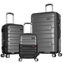 Load image into Gallery viewer, The black carry-on, medium, and large suitcases arranged on a white background.
