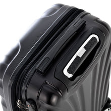 Load image into Gallery viewer, Angled top view of the black hard shell suitcase. It features a grip handle and a telescopic handle.