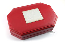 Load image into Gallery viewer, Angled top view of the red leather presentation box. The surface has become brittle due to age.