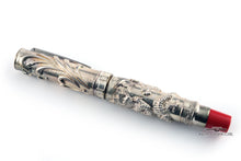 Load image into Gallery viewer, Side view of the silver fountain pen with the cap on.