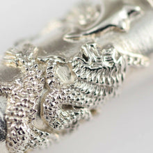 Load image into Gallery viewer, Close up to the pen's intricate engraved decorations.
