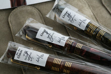 Load image into Gallery viewer, Close up on the three pens in their sealed sleeves.