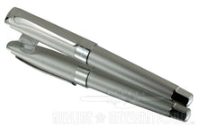 Load image into Gallery viewer, The fountain pen with the cap, laid on a mirror.