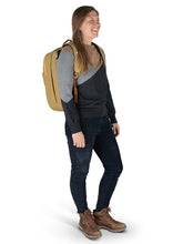 Load image into Gallery viewer, A young woman carrying the backpack on a white background.