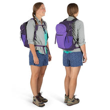 Load image into Gallery viewer, Angled front and back views of a young woman carrying the purple backpack.