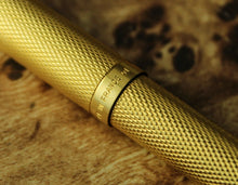Load image into Gallery viewer, Close up to the band at the center, featuring engraved text: MADE IN FRANCE