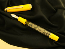 Load image into Gallery viewer, Front view of the fountain pen with the cap next to it.