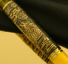 Load image into Gallery viewer, Close up to the dragon design on the pen barrel.