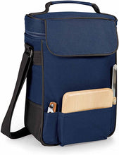 Load image into Gallery viewer, Angled front view of the blue wine tote bag with a cutting board and two knives arranged on the pockets.