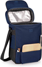 Load image into Gallery viewer, Angled front view of the blue bag with the top opened.