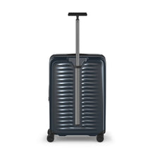 Load image into Gallery viewer, Back panel view of the dark blue suitcase with the telescopic handle extended.