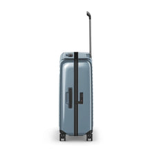 Load image into Gallery viewer, Side panel view of the light blue suitcase, featuring a grab handle and a TSA approved three-digit combination lock.