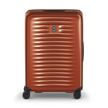 Load image into Gallery viewer, Front panel view of the orange suitcase with the telescopic handle retracted.