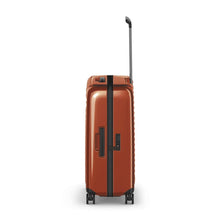 Load image into Gallery viewer, Side panel view of the orange suitcase, featuring a grab handle, and a TSA approved three-digit combination lock.