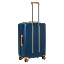 Load image into Gallery viewer, Angled back view of the suitcase on a white background. The telescopic handle is pulled up.