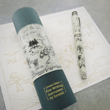 Load image into Gallery viewer, Angled side view of the 100 Aker Wood fountain pen with the matching gift tube on a print.