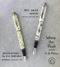 Load image into Gallery viewer, Front views of the Fountain Pens with text: 100 Aker Wood Limited Edition 517, Decorations by E.H. Shepard numbered catalog item, Winnie-the-Pooh, A.A. Milne.
