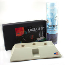 Load image into Gallery viewer, The Enterprise pen gift tube arranged with the launchpad and packaging.