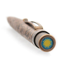 Load image into Gallery viewer, Top disk view of the Retro 51 Smithsonian Hummingbird and Flowers rollerball pen. It has the Smithsonian sun logo.