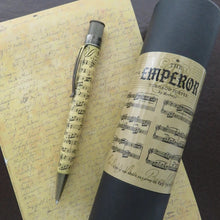 Load image into Gallery viewer, Side view of the pen arranged with the presentation gift tube.