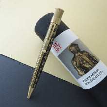 Load image into Gallery viewer, Front view of the pen leaning on the gift tube.