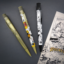 Load image into Gallery viewer, The three Rocketeer pens arranged with a comic on a gray background.