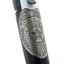 Load image into Gallery viewer, Close up to the police badge on the barrel.