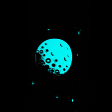 Load image into Gallery viewer, Close up to the pen's moon design glowing in the dark.