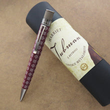Load image into Gallery viewer, Retro 51 Harriet Tubman Rollerball Pen and Matching Tube on a textured light brown background.