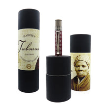Load image into Gallery viewer, The Retro 51 Harriet Tubman Rollerball Pen with the gift tubes. The front of the tag has written: Harriet Tubman Retro 51 Vintage Metalsmith. The side has a portrait of Harriet wearing her head scarf.