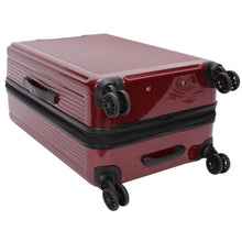 Load image into Gallery viewer, Bottom panel view of the red suitcase. It features four spinner wheels, and a grip handle.