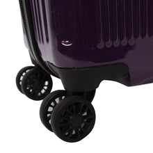 Load image into Gallery viewer, Close up to the spinner wheel on the purple suitcase.