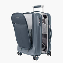 Load image into Gallery viewer, Angled front panel view of the winter blue suitcase with the compartments unzipped.