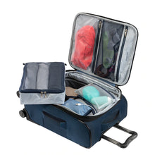 Load image into Gallery viewer, Interior view of the blue suitcase filled with clothes and travel accessories.