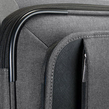 Load image into Gallery viewer, Angled close-up to the suitcase's front panel.