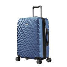 Load image into Gallery viewer, Angled front panel view of the twilight blue, hard shell suitcase.