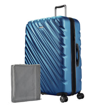 Load image into Gallery viewer, Angled front panel view of the Twilight blue hard shell suitcase with a packing cube next to it.