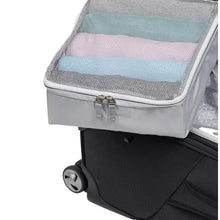Load image into Gallery viewer, A packing cube placed on top of the black suitcase.