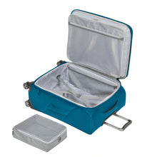 Load image into Gallery viewer, Interior view of the teal suitcase with a packing cube set next to it