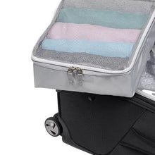 Load image into Gallery viewer, Close up to the packing cube filled with folded shirts, placed on top of the suitcase.