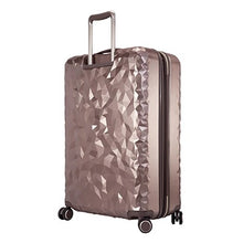 Load image into Gallery viewer, Angled back panel view of the topaz suitcase with a geometric pattern.