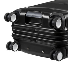 Load image into Gallery viewer, Angled bottom close up to the black hard shell suitcase. It features four spinner wheels and a grab handle.