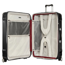 Load image into Gallery viewer, Interior view of the black suitcase. It features a zipper-closing panel divider, pockets, and adjustable straps.