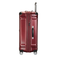 Load image into Gallery viewer, Side panel view of the red hard shell suitcase. It features a grab handle.