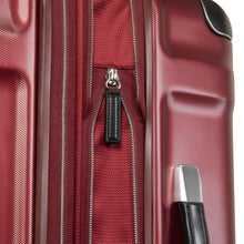 Load image into Gallery viewer, Close up to the red suitcase's expandable zipper.