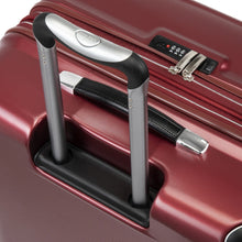 Load image into Gallery viewer, Top panel close up on the red suitcase. It features a telescopic handle, a grab handle, and a TSA approved, three-digit combination lock.